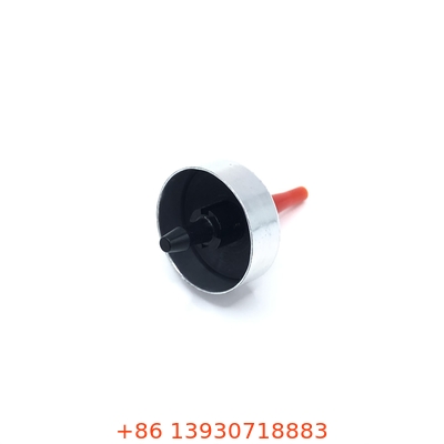 Une soupape de remplissage universelle de butane pour les poêles de camping portables.