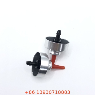 Une soupape de remplissage universelle de butane pour les poêles de camping portables.